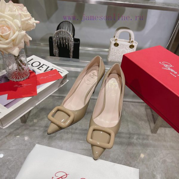 This Viv 'Choc Lacquer Buckle High Heel is handmade in shiny patent leather, embellished wit60q0am78