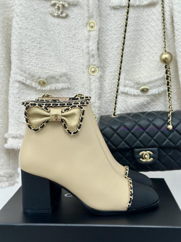 parrx κσλοκσιρινεε παντοφλες | Chanel | Chanel 24P Chain Bow Thick Heel BootsThis Season's Rocket Divine Chanel Classic Bowkno 9zfo0sy5 | αθλητικα παπουτσια εωσ 20 ευρω