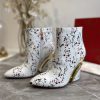 christian louboutin wedges boots