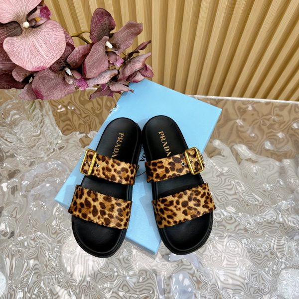 Prada’s classic triangle label platform double-buckle slippers collection Ultralight sandals B