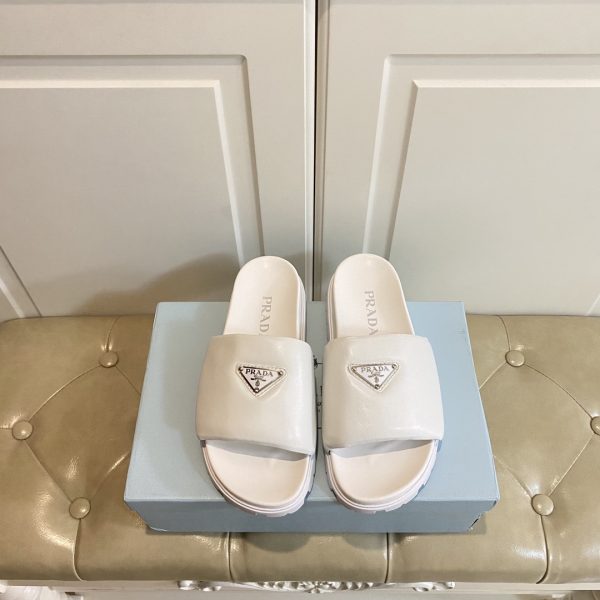 Prada's new slippers in sheepskin white