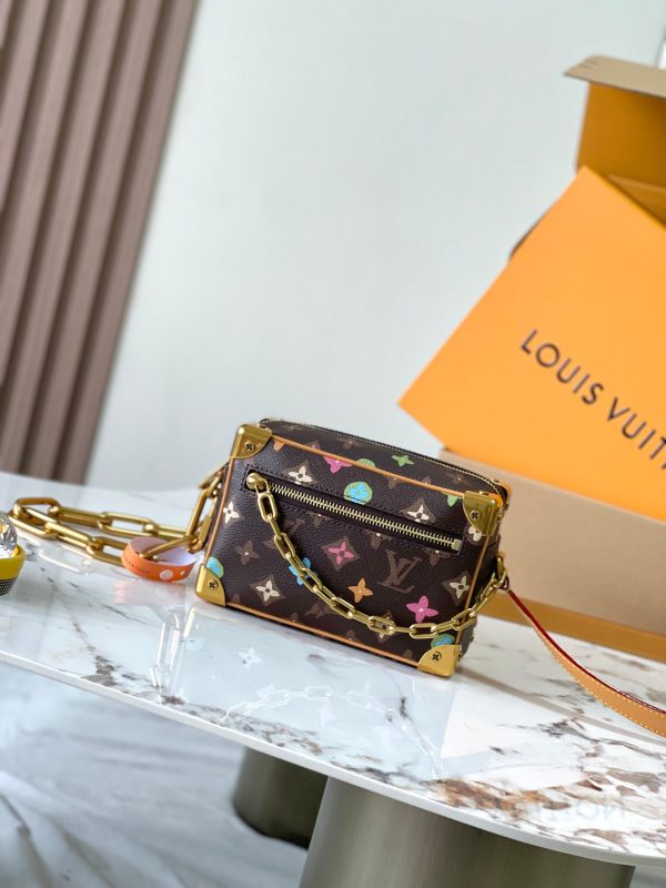VersionThis Mini Soft Trunk handbag combines classic heritage with