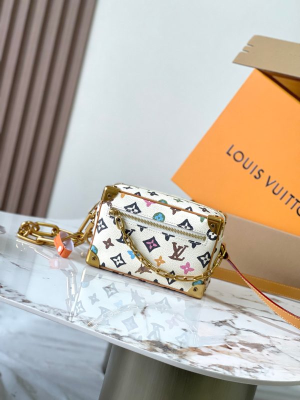 VersionThis Mini Soft Trunk handbag combines classic heritage with