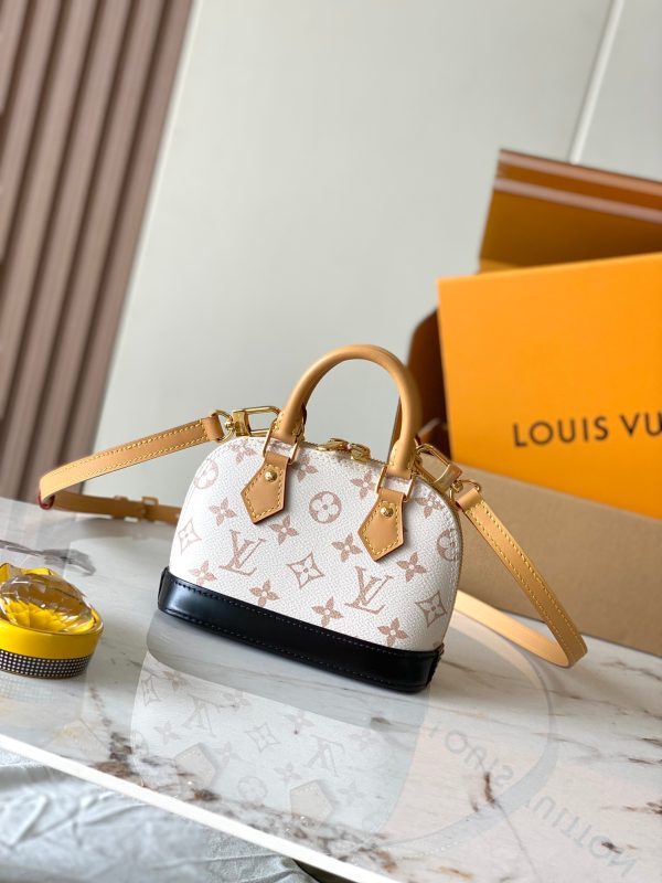 VersionThis Nano Alma handbag condenses the classic configuration o