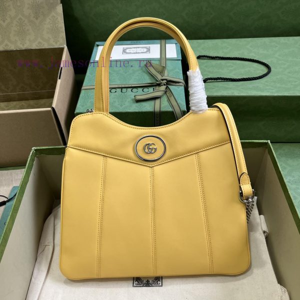 Gucci This mini GG small backpack is vividly presented with the brand's beloved classic styl iligci5u
